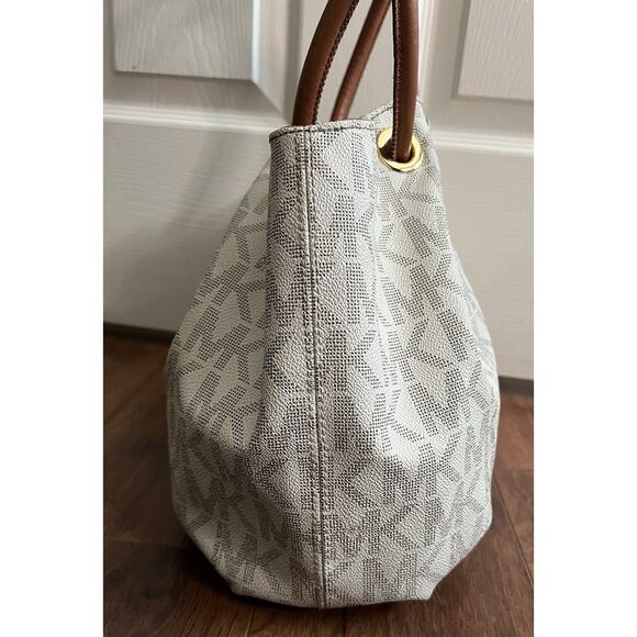 MICHAEL KORS Signature Canvas Leather Tasseled Ring Bucket Tote with BONUS - Picture 8 of 16